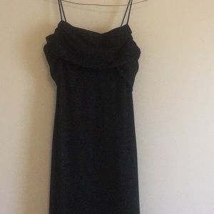 Floor length black dress with silver accents.